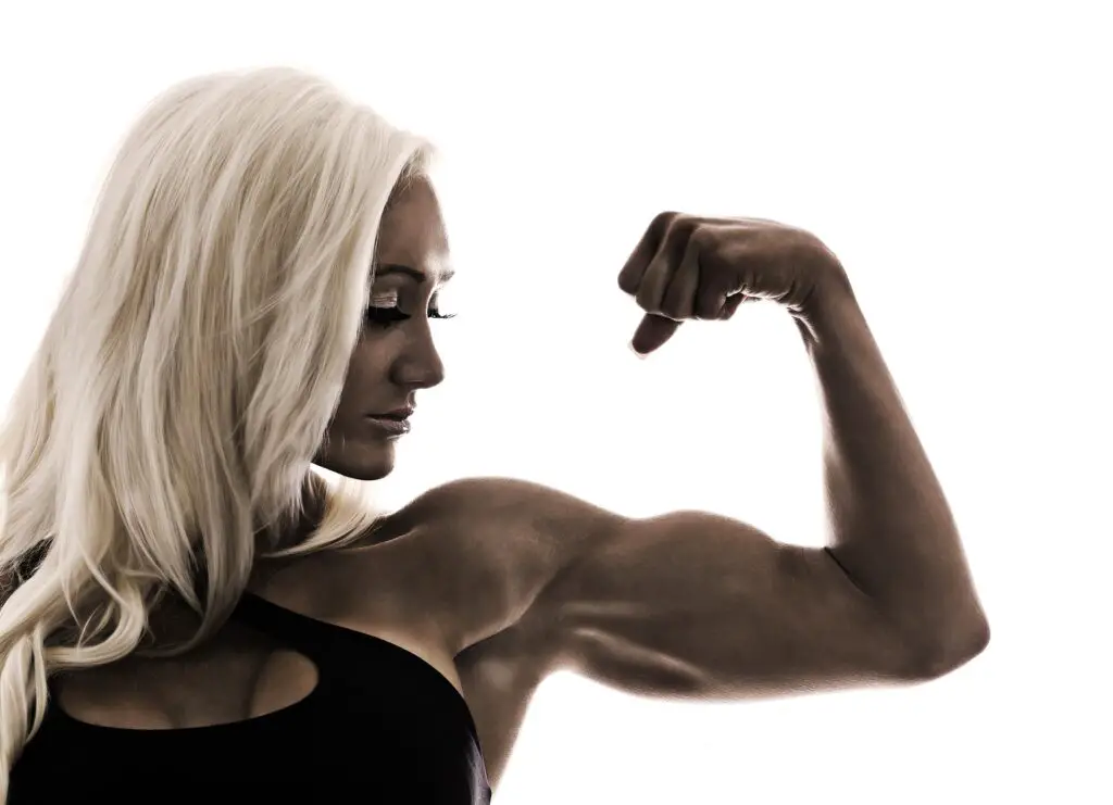 woman flexing bicep